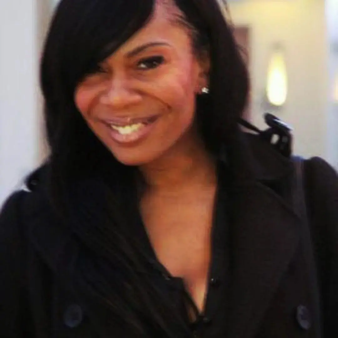 Smiling woman with long dark hair
