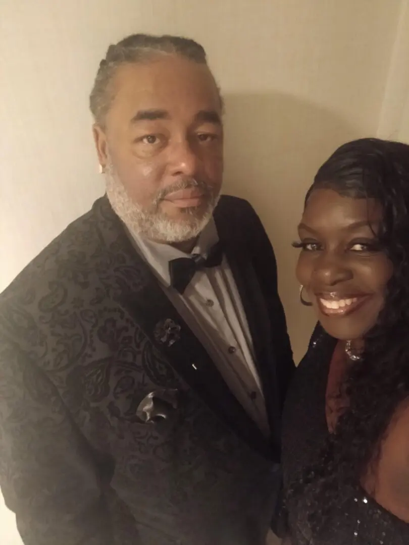 Smiling couple in formal evening attire