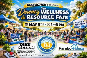 A colorful flyer promoting the “Downey Wellness & Resource Fair.” The design shows an outdoor community fair with people walking among booths and tents decorated with balloons and banners, surrounded by palm trees. Text highlights the event name, date, and time: May 9th from 1–6 PM. Additional text promotes free resources, health and wellness services, and community support from Take Action, the Los Angeles County Department of Mental Health, Rambo House, and 63 California. The tagline reads, “Be yourself | Be your roots | Be your community.”